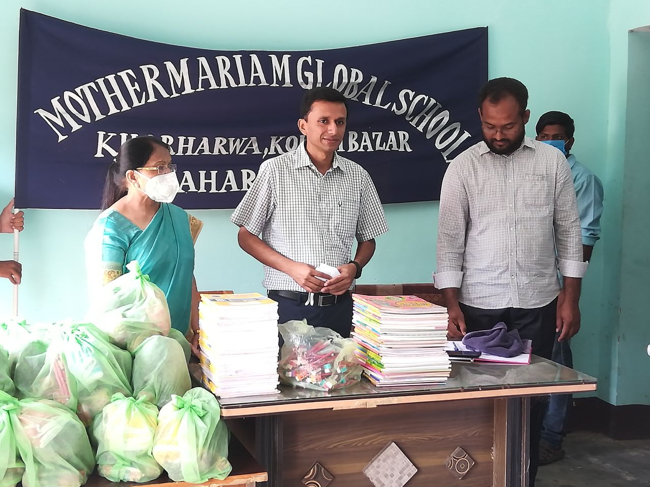 Social Initiative by School - Distribution of Food and Books at Khaira